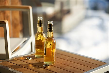 Beer Bottles on Table Stock Photo - Rights-Managed, Code: 700-02701366