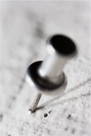 Thumbtack Stuck in Wall Stock Photo - Rights-Managed, Code: 700-02702526