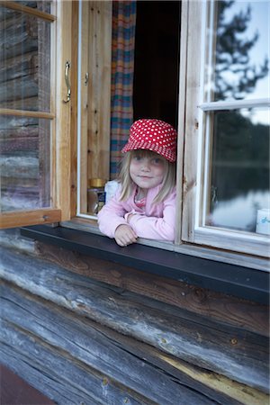 Girl Looking out Cabin Window Stock Photo - Rights-Managed, Code: 700-02702600