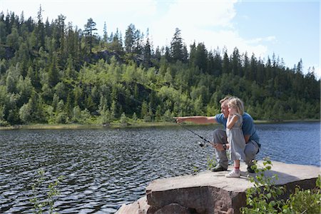 pescatrice - Father and Daughter Fishing, Norway Fotografie stock - Rights-Managed, Codice: 700-02702602