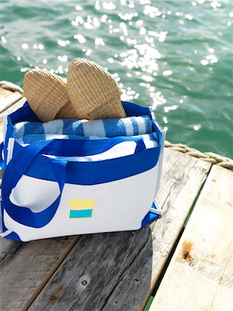 Towels and Shoes on a Dock by the Ocean, Belize Stock Photo - Rights-Managed, Code: 700-02702710