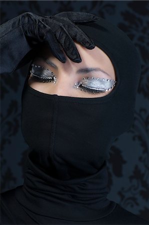 Close-up of Woman Wearing Black Fotografie stock - Rights-Managed, Codice: 700-02724737