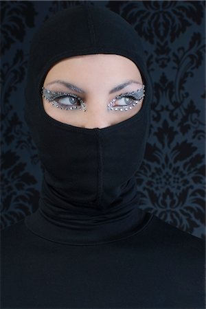 Close-up of Woman Wearing Black Fotografie stock - Rights-Managed, Codice: 700-02724738