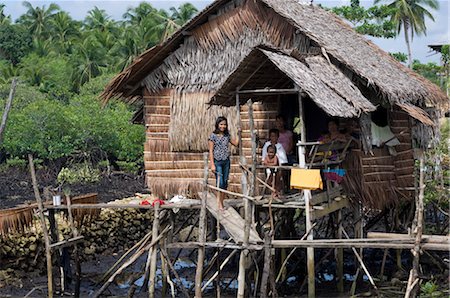 people and thatched houses - Siargao Island, Mindanao, Philippines Stock Photo - Rights-Managed, Code: 700-02723119