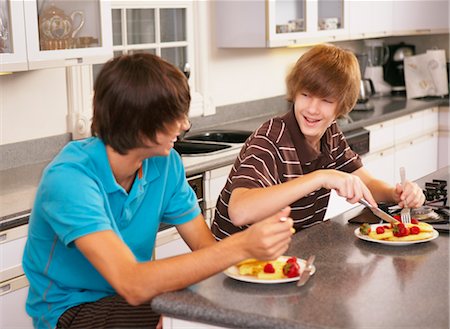 Boys Eating Breakfast Stock Photo - Rights-Managed, Code: 700-02738784