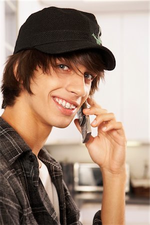 Teenage Boy Talking on Cell Phone Stock Photo - Rights-Managed, Code: 700-02738800