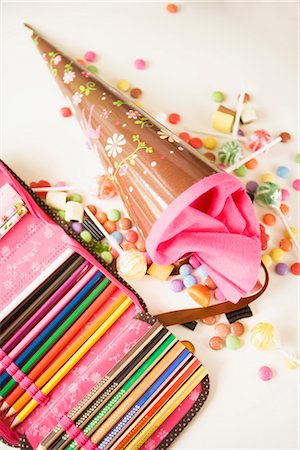 pencil crayon - Open Pencil Case and Spilled Candy Stock Photo - Rights-Managed, Code: 700-02756417