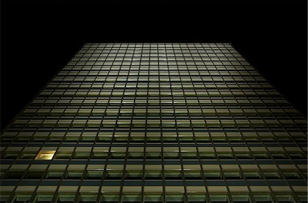 david zuber - One Illuminated Window in Office Building Foto de stock - Con derechos protegidos, Código: 700-02756552