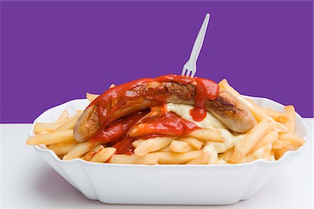 French Fries and Sausage Foto de stock - Con derechos protegidos, Código: 700-02756579