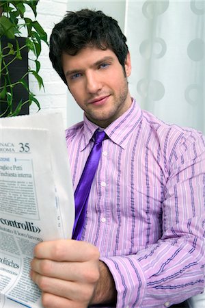 Businessman Reading Newspaper Stock Photo - Rights-Managed, Code: 700-02756584