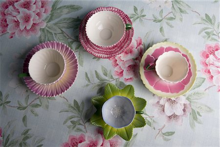 empty tea cups - Overhead of Four Fancy Teacups on Table Stock Photo - Rights-Managed, Code: 700-02757173