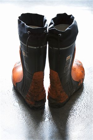 rubber boots in mud - Rubber Boots Foto de stock - Con derechos protegidos, Código: 700-02757470