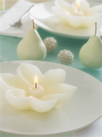 pure light - Flower Shaped Candles on Dishes Stock Photo - Rights-Managed, Code: 700-02757608