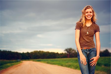 road less travelled - Woman Standing on Country Road, Statesboro, Georgia, USA Stock Photo - Rights-Managed, Code: 700-02786849