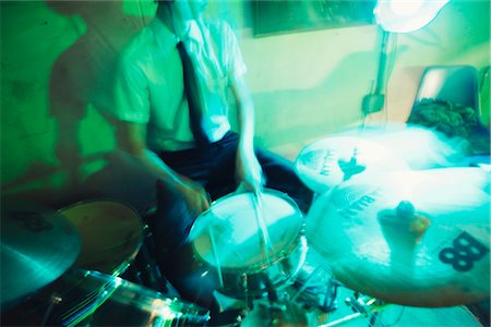 Young Man Playing the Drums Stock Photo - Rights-Managed, Code: 700-02786869