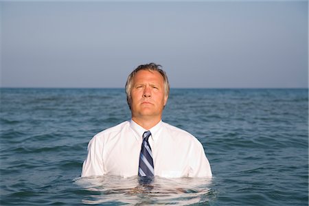 singled out - Businessman in the Ocean Stock Photo - Rights-Managed, Code: 700-02797985