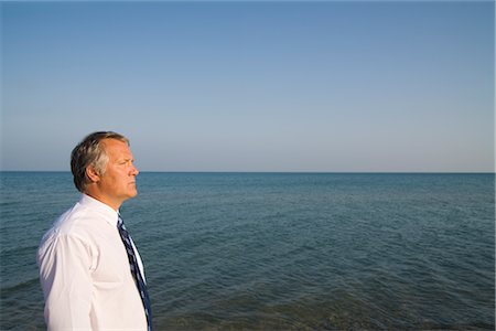 Businessman by the Ocean Foto de stock - Con derechos protegidos, Código: 700-02797983