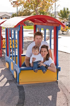 dad with kid on playground - Portrait of Family Stock Photo - Rights-Managed, Code: 700-02791574