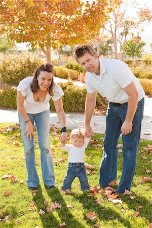 father mother kid holding hands in park - Family Outdoors Stock Photo - Rights-Managed, Code: 700-02791580