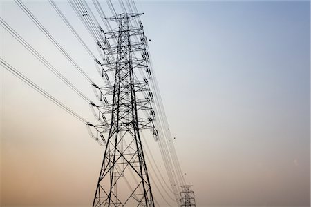 power pylons - Silhouette of Hydro Towers at Sunset, Bangkok, Thailand Stock Photo - Rights-Managed, Code: 700-02828364