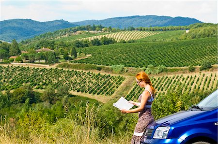 Lost Woman Reading Road Map, Chianti, Tuscany, Italy Stock Photo - Rights-Managed, Code: 700-02828620