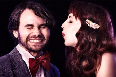 pictures of people at formal parties - Close-up of Woman Blowing in Man's Face Stock Photo - Rights-Managed, Code: 700-02828641