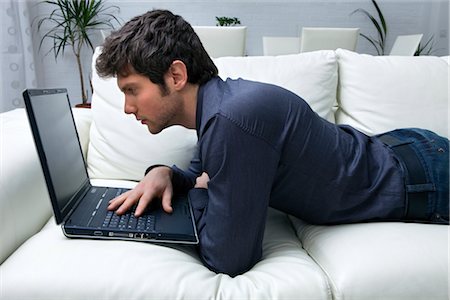 Man Using Laptop Stock Photo - Rights-Managed, Code: 700-02833399