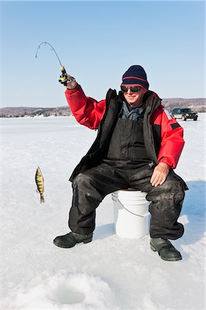 Ice Fishing in Magog, Quebec, Canada Foto de stock - Con derechos protegidos, Código: 700-02833519