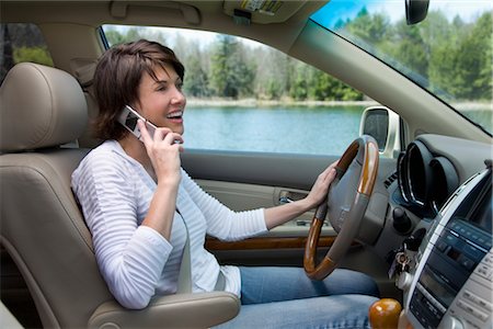 dashboard in car - Driver Talking on Cell Phone Stock Photo - Rights-Managed, Code: 700-02833578