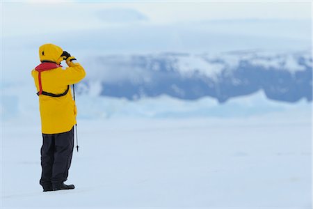Tourist Using Binoculars, Snow Hill Island, Antarctica Stock Photo - Rights-Managed, Code: 700-02887002