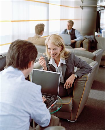 pictures of people working in the airports - Business People Waiting in Airport Lounge Foto de stock - Con derechos protegidos, Código: 700-02887156