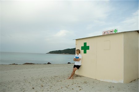 simsearch:700-02887500,k - MAn by First Aid Station, Ibiza, Spain Stock Photo - Rights-Managed, Code: 700-02887486