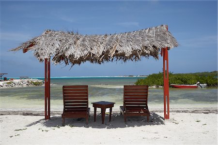 Lounger Chairs and Shade, Lac Bay, Bonaire, Netherlands Antilles Stock Photo - Rights-Managed, Code: 700-02903740