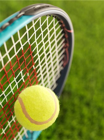 palla da tennis - Close-up of Tennis Ball and Racquet Fotografie stock - Rights-Managed, Codice: 700-02912415