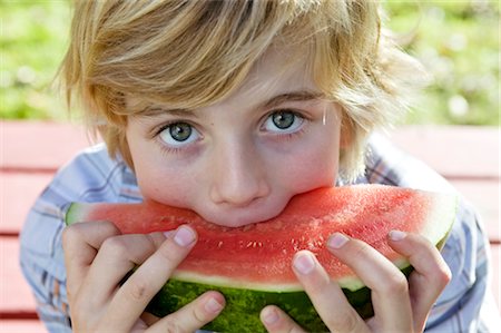 Boy Eating Watermelon Stock Photo - Rights-Managed, Code: 700-02922693