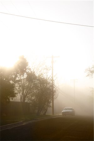 street in sunset with cars - Morning Fog Over Neighbourhood Stock Photo - Rights-Managed, Code: 700-02922831