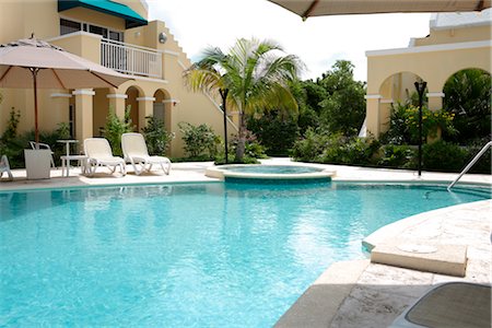 palm house - Pool-Bereich am Resort Condominiums, Turks- und Caicosinseln Stockbilder - Lizenzpflichtiges, Bildnummer: 700-02922922