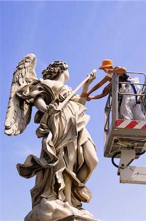 Tourists Touching Statue at Castel Sant'Angelo, Rome, Italy Stock Photo - Rights-Managed, Code: 700-02935361