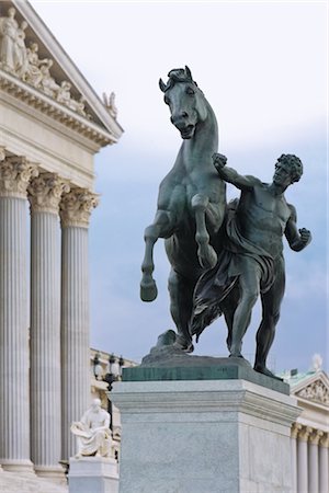 facade statue - Horse Tamer Statue in Front of the Parliament Building, Vienna, Austria Stock Photo - Rights-Managed, Code: 700-02935528