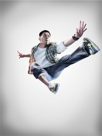 dancer jumping in the air - Portrait of Breakdancer Stock Photo - Rights-Managed, Code: 700-02935842