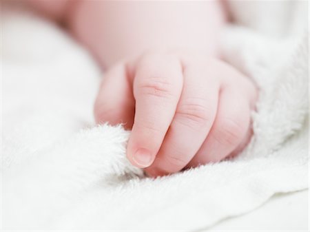 Close-up of Baby's Hand Foto de stock - Con derechos protegidos, Código: 700-02943476