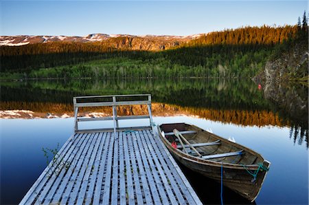 Dock and Rowboat on Lake, Borge-fjellet, Norway Fotografie stock - Rights-Managed, Codice: 700-02967732