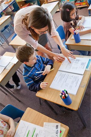 people bending over - Children and Teacher in Grade One Classroom Stock Photo - Rights-Managed, Code: 700-02989950