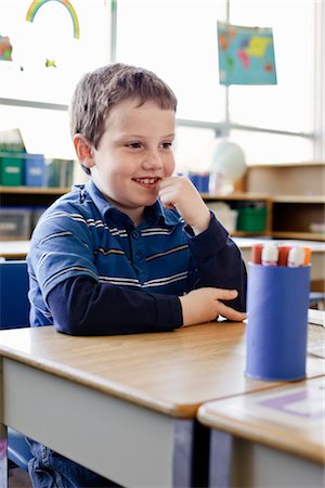 Boy in Grade One Classroom Foto de stock - Con derechos protegidos, Código: 700-02989952