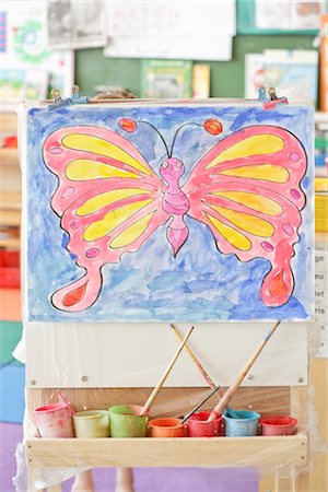 paint (substance) - Child's Painting on an Easel Stock Photo - Rights-Managed, Code: 700-02989975