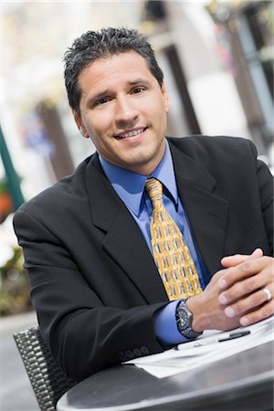 Businessman Sitting at Outdoor Cafe Stock Photo - Rights-Managed, Code: 700-03004043