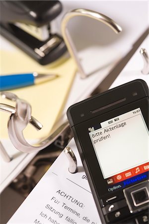 stapler - Close-up of Text Message Foto de stock - Con derechos protegidos, Código: 700-03016998