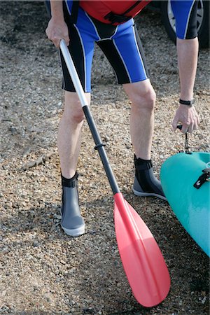 Man With Paddle, Holding End of Canoe Foto de stock - Con derechos protegidos, Código: 700-03017084