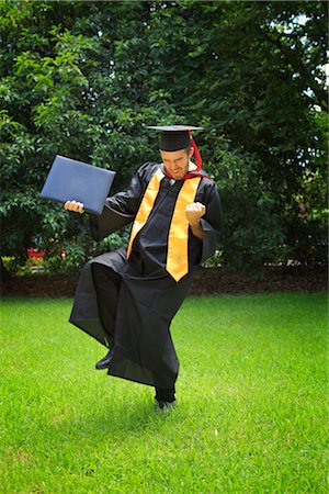 person with cap and gown - Portrait of Graduate Stock Photo - Rights-Managed, Code: 700-03017531