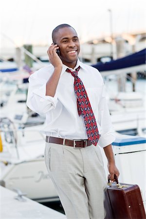 después del trabajo - Businessman Talking on Cell Phone Foto de stock - Con derechos protegidos, Código: 700-03017579